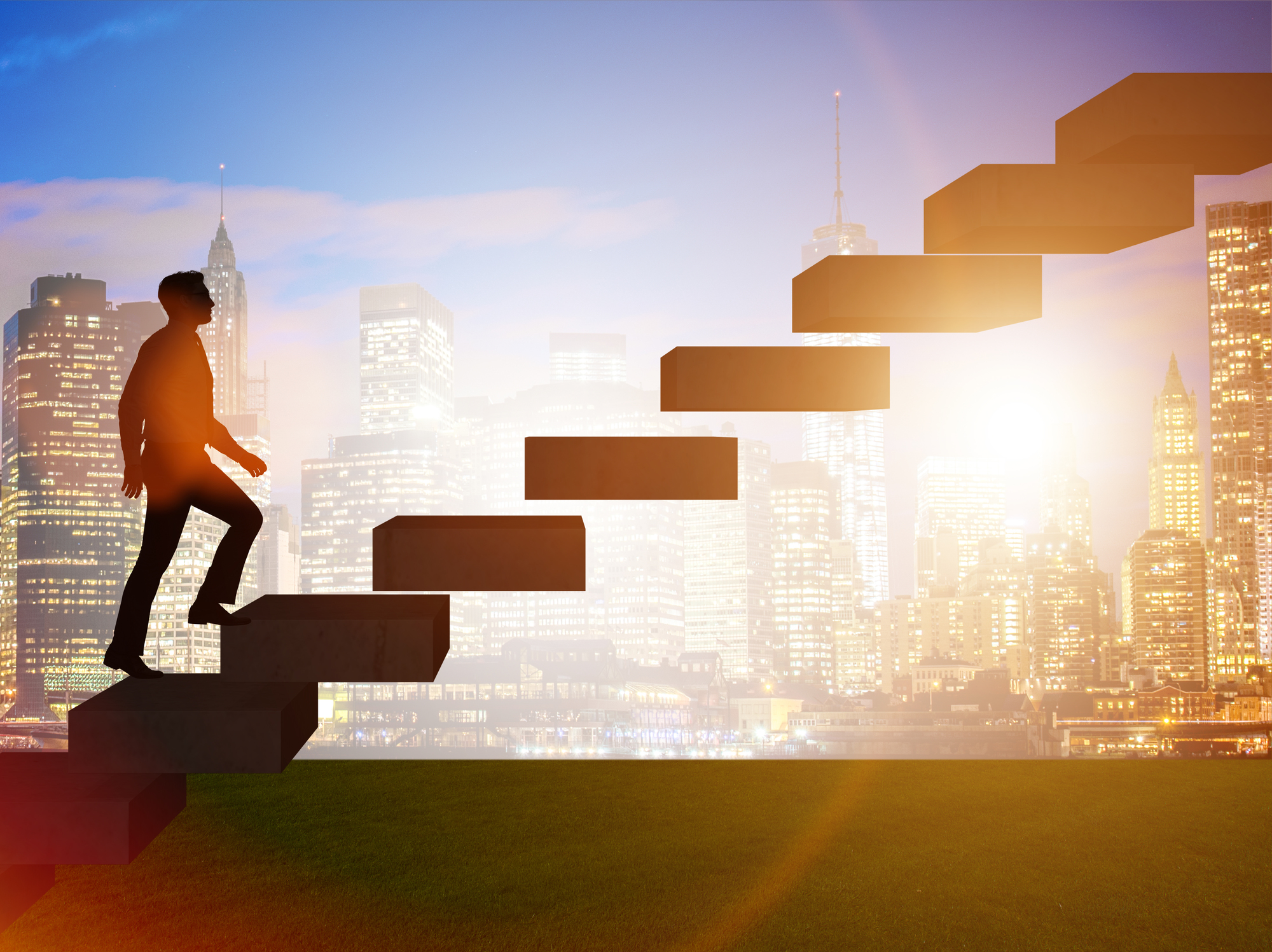 Businessman in career promotion concept with stairs